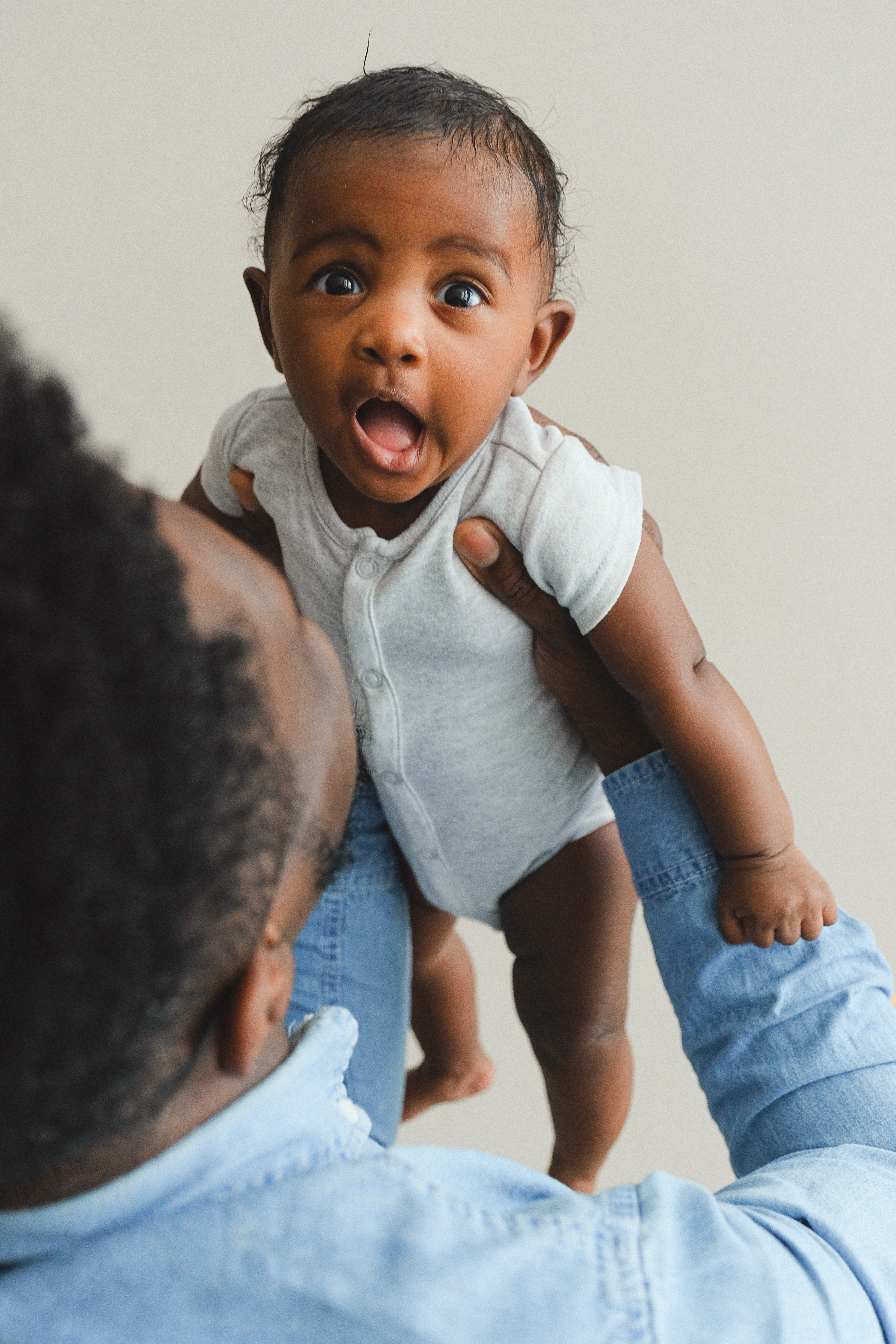 baby surprised in upright